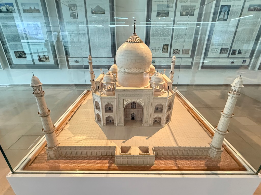 Scale model of the Taj Mahal displayed in a glass case at the Islamic Arts Museum in Kuala Lumpur.